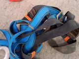 a pair of shoes and a pair of scissors on the ground