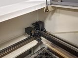 a machine that is working on a piece of metal