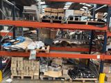 a large amount of items on the shelves in the warehouse
