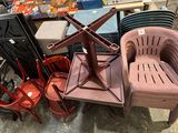 many different chairs and tables in a room