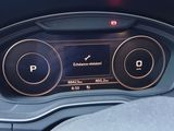 the dashboard of a car with a digital display on it