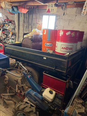 an image of a garage with a truck in it