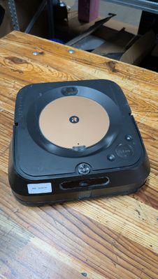 a record player sitting on top of a wooden table