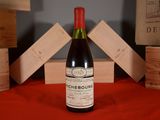a bottle of wine that is sitting on a table
