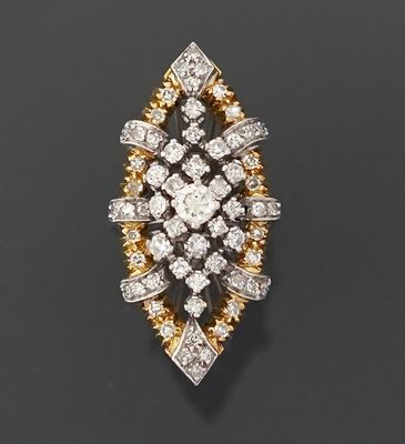 Originale et imposante bague en deux tons d'or gris et jaune…