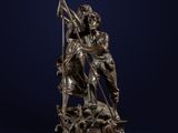 une statue en bronze représentant un homme et une femme sur un bateau