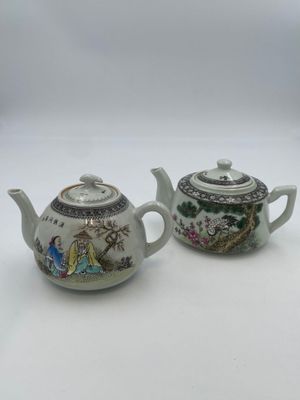 pair of chinese porcelain teapots with hand painted scenes