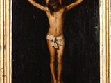 une peinture à l'huile représentant une personne sur une croix, dans un cadre doré