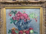 un tableau représentant un vase de fleurs posé sur un chevalet