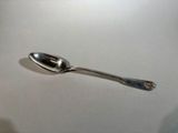 a spoon that is sitting on a table