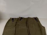the back of a pair of olive green pants on a white surface