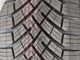 an image of a close up of a tire on a white surface