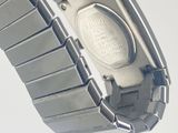 a close up of a wrist watch on a white surface