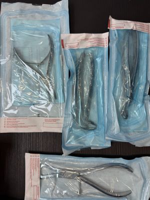 four bags of fish in the middle of a table