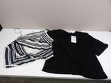 a black and white striped shirt and a black and white striped skirt
