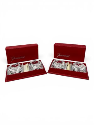 a pair of wine glasses in a red gift box