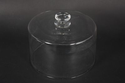 a clear plastic container with a clear lid on a black background