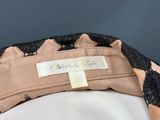 a close up of a hat with a label on it