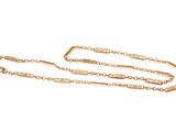 a close up of a gold chain on a white background