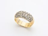 a gold ring with diamonds on a white background