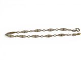 a close up of a chain on a white background
