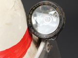 a close up of a helmet with a light on it