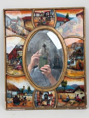 une photo d'une photo d'une personne en train de se prendre en photo dans un miroir