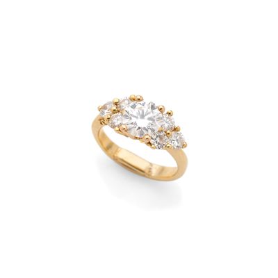 a diamond and eighteen karat gold ring