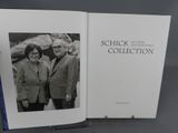 an open book with a black and white photo of a man and a woman