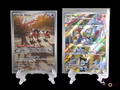 two pokemon cards on display on a black background