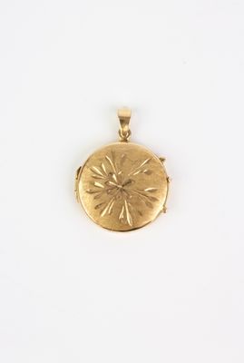 a close up of a gold locke on a white background