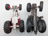 a toy truck with two large tires attached to it