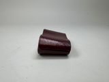 leather wallet on a white surface with a white background