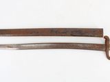 pair of two old swords on a white background with a ruler