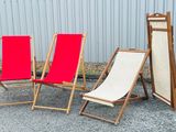 three chairs that are sitting next to each other