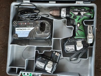 a tool kit in a metal case on the ground