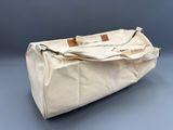 an image of a large white bag sitting on top of a table