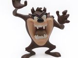 a figurine of a cartoon character on a white background