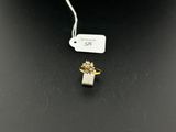 an image of a gold ring with a flower on top of it