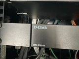 a close up view of a rack with many wires in it
