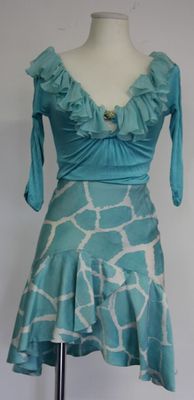 blue and white giraffe print dress on a mannequin