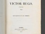 an open book with a black and white title on it