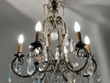 a chandelier that is hanging from the ceiling