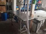an image of a room with a table and a hose