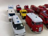 a lot of toy cars that are lined up together