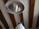 two lamps hanging from the ceiling in a room