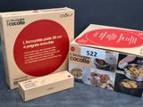 a box of cookies and a box of cookies on the table