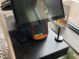 an image of a computer on a desk in front of a window