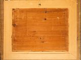 an old picture of a wooden frame with a hole in it