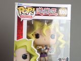 funko pop vinyl figure of a male valentine in a box on a table